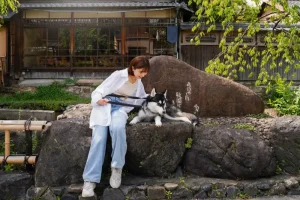 hong konger female with siberian huskey in the park